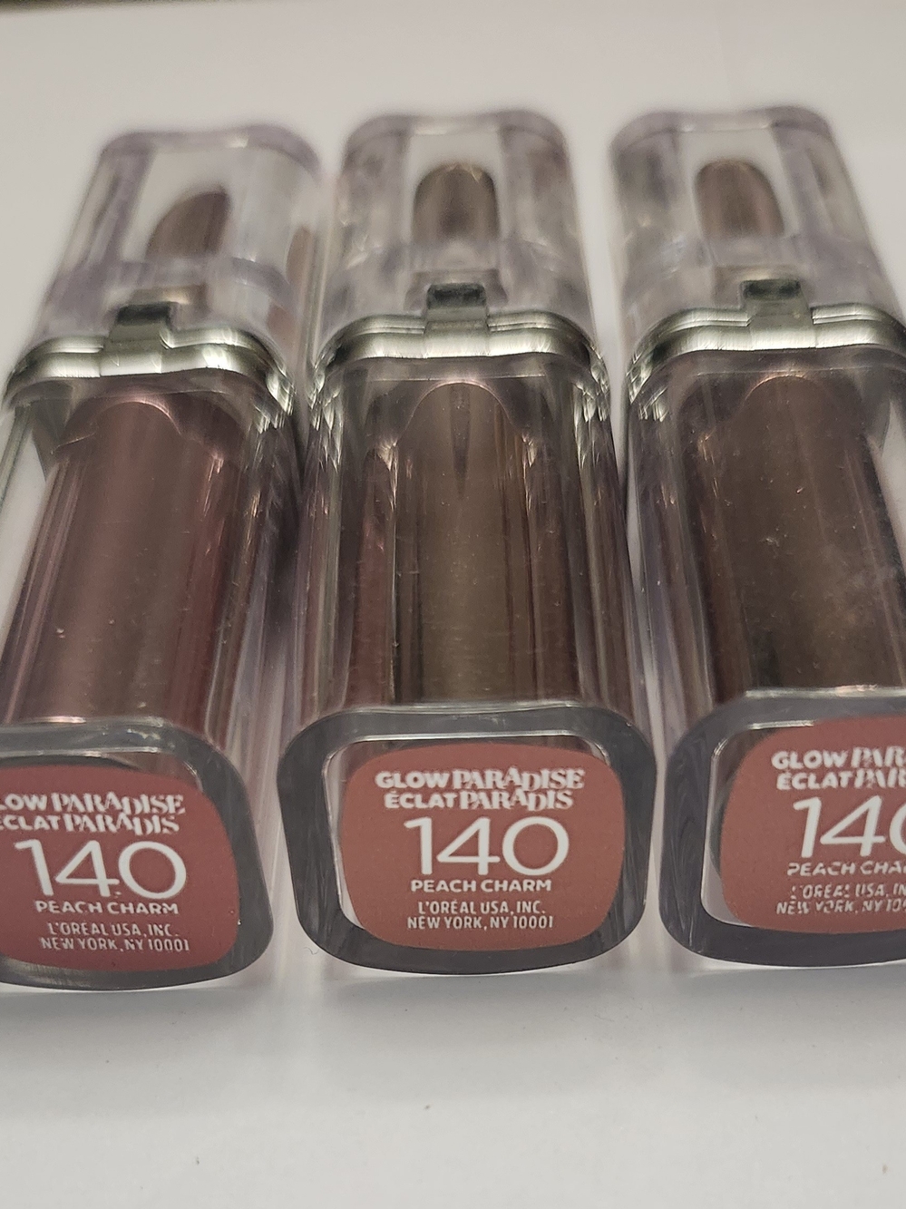 L'Oréal Glow Paradise Lipstick 140 Peach Charm - New Set Of 3